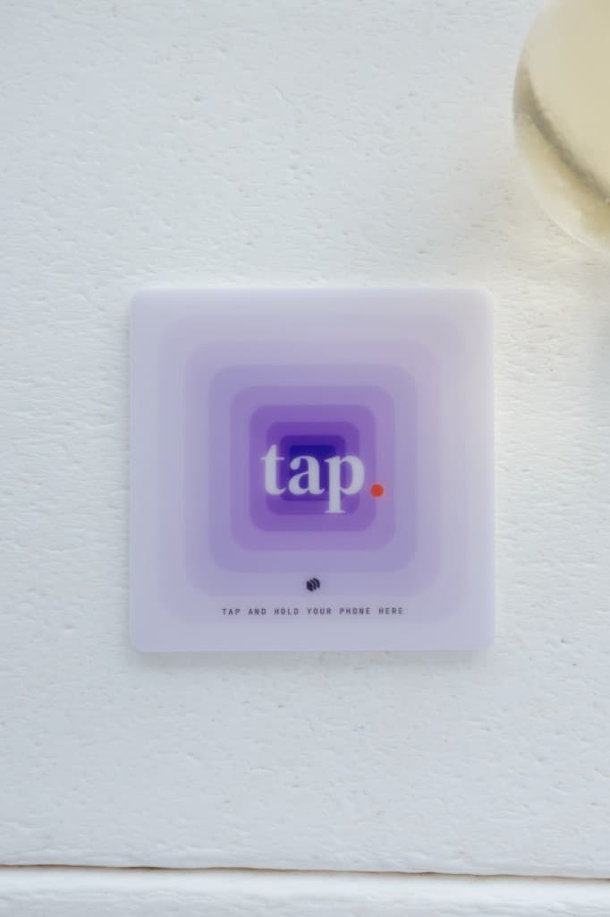Tap NFC tag programmed for a venue